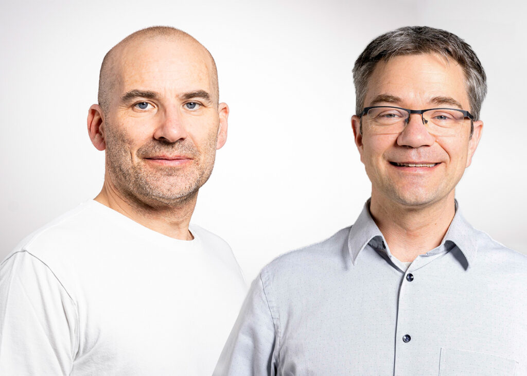 Portrait of Thomas Geiger and Davide Chiarugi on white background